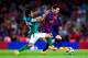 BARCELONA, SPAIN - AUGUST 18: Lionel Messi of FC Barcelona competes for the ball with Jose Juan Vazquez of Club Leon during the Joan Gamper Trophy match between FC Barcelona and Club Leon at Camp Nou on August 18, 2014 in Barcelona, Spain. (Photo by Dav
