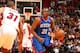 Young running the break against the Miami Heat.
