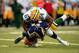 ST LOUIS, MO - AUGUST 16: Mike Pennel #64 of the Green Bay Packers sacks quarterback Shaun Hill #14 of the St. Louis Rams during the preseason game at Edward Jones Dome on August 16, 2014 in St Louis, Missouri. (Photo by Jamie Squire/Getty Images)