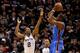 SAN ANTONIO, TX - MAY 19: Kevin Durant #35 of the Oklahoma City Thunder shoots over Kawhi Leonard #2 of the San Antonio Spurs in the first quarter in Game One of the Western Conference Finals during the 2014 NBA Playoffs at AT&T Center on May 19, 2014 in