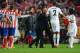 LISBON, PORTUGAL - MAY 24: Diego Simeone, Coach of Club Atletico de Madrid (3R) argues with Raphael Varane of Real Madrid (2) as Marcelo of Real Madrid intervenes during the UEFA Champions League Final between Real Madrid and Atletico de Madrid at Estadi