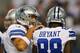 ARLINGTON, TX - AUGUST 16: Tony Romo #9 of the Dallas Cowboys talks with Dez Bryant #88 of the Dallas Cowboys between plays against the Baltimore Ravens in the first half of their preseason game at AT&T Stadium on August 16, 2014 in Arlington, Texas. (P