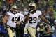 SEATTLE, WA - JANUARY 11: Running back Khiry Robinson #29 of the New Orleans Saints celebrates after scoring on a one-yard touchdown run in the fourth quarter against the Seattle Seahawks during the NFC Divisional Playoff Game at CenturyLink Field on Jan