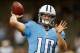NEW ORLEANS, LA - AUGUST 15: Jake Locker #10 of the Tennessee Titans warms up on field before the start of the first preseason game between the New Orleans Saints and the Tennessee Titans at Mercedes-Benz Superdome on August 15, 2014 in New Orleans, Loui