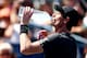 NEW YORK, NY - AUGUST 25: Andy Murray of Great Britain drinks during a break against Robin Haase of the Netherlands during his men's singles first round match on Day One of the 2014 US Open at the USTA Billie Jean King National Tennis Center on August 25