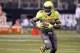 Jan 2, 2014; St. Petersburg, FL, USA; Team Nitro running back Dalvin Cook (4) runs with the ball against Team Highlight during the first half of the Under Armour All America football game at Tropicana Field. Mandatory Credit: Kim Klement-USA TODAY Sports