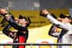 SPA, BELGIUM - AUGUST 24: Daniel Ricciardo of Australia and Infiniti Red Bull Racing celebrates on the podium next to Valtteri Bottas of Finland and Williams after winning the Belgian Grand Prix at Circuit de Spa-Francorchamps on August 24, 2014 in Spa,