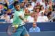 CINCINNATI, OH - AUGUST 17: Roger Federer of Switzerland returns to David Ferrer of Spain during a final match on day 9 of the Western & Southern Open at the Linder Family Tennis Center on August 17, 2014 in Cincinnati, Ohio. (Photo by Jonathan Moore/Ge