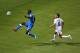 RECIFE, BRAZIL - JUNE 20: Mario Balotelli of Italy shoots wide against Oscar Duarte of Costa Rica during the 2014 FIFA World Cup Brazil Group D match between Italy and Costa Rica at Arena Pernambuco on June 20, 2014 in Recife, Brazil. (Photo by Michael