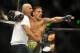 Aug 23, 2014; Tulsa, OK, USA; Rafael Dos Anjos (blue gloves) celebrates after defeating Benson Henderson in the Main Event, Lightweight Bout at BOK Center. Mandatory Credit: Mark D. Smith-USA TODAY Sports