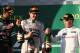 MELBOURNE, AUSTRALIA - MARCH 16: Race winner Nico Rosberg (C) of Germany and Mercedes GP celebrates on the podium with second placed Daniel Ricciardo (L) of Australia and Infiniti Red Bull Racing and third placed Kevin Magnussen (R) of Denmark and McLare