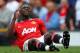 MANCHESTER, ENGLAND - AUGUST 28: Danny Welbeck of Manchester United lies injured on the pitch during the Barclays Premier League match between Manchester United and Arsenal at Old Trafford on August 28, 2011 in Manchester, England. (Photo by Alex Livese