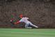 CHICAGO, IL - MAY 02: Randal Grichuk #15 of the St. Louis Cardinals misses a catch on Welington Castillo of the Chicago Cubs double during the second inning on May 2, 2014 at Wrigley Field in Chicago, Illinois. (Photo by David Banks/Getty Images)