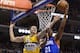 Dec 7, 2013; Philadelphia, PA, USA; Philadelphia 76ers forward Thaddeus Young (21) shoots as Denver Nuggets center Timofey Mozgov (25) defends during the first quarter at the Wells Fargo Center. Mandatory Credit: Howard Smith-USA TODAY Sports