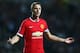 MILTON KEYNES, ENGLAND - AUGUST 26: Jonny Evans of Manchester United shows his frustration during the Capital One Cup Second Round match between MK Dons and Manchester United at Stadium mk on August 26, 2014 in Milton Keynes, England. (Photo by Clive Mas