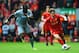 LIVERPOOL, ENGLAND - MAY 11: Joe Allen of Liverpool takes on Moussa Sissoko of Newcastle United during the Barclays Premier League match between Liverpool and Newcastle United at Anfield on May 11, 2014 in Liverpool, England. (Photo by Laurence Griffit