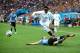 SAO PAULO, BRAZIL - JUNE 19: Martin Caceres of Uruguay tackles Danny Welbeck during the 2014 FIFA World Cup Brazil Group D match between Uruguay and England at Arena de Sao Paulo on June 19, 2014 in Sao Paulo, Brazil. (Photo by Julian Finney/Getty Image