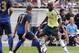 PITTSBURGH, PA - JULY 27: Mario Balotelli #45 of AC Milan handles the ball against Jack Rodwell #17 of Manchester City during International Champions Cup 2014 at Heinz Field on July 27, 2014 in Pittsburgh, Pennsylvania. (Photo by Justin K. Aller/Getty I