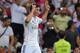 MADRID, SPAIN - AUGUST 19: James Rodriguez celebrates after scoring during the Supercopa first leg match between Real Madrid and Club Atletico de Madrid at Estadio Santiago Bernabeu on August 19, 2014 in Madrid, Spain. (Photo by Denis Doyle/Getty Images
