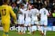 CARDIFF, WALES - AUGUST 12: (L-R) Cristiano Ronaldo of Real Madrid celebrates with teammates James Rodriguez, Gareth Bale and Karim Benzema after scoring the opening goal during the UEFA Super Cup between Real Madrid and Sevilla FC at Cardiff City Stadiu