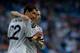 MADRID, SPAIN - MAY 04: Angel Di Maria (L) of Real Madrid CF celebrates scoring their second goal with team-mate Luka Modric (R) during the La Liga match between Real Madrid CF and Real Valladolid CF at Estadio Santiago Bernabeu on May 4, 2013 in Madrid,