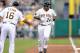 PITTSBURGH, PA - AUGUST 25: Pedro Alvarez #24 of the Pittsburgh Pirates celebrates his solo home run with third base coach Nick Leyva during the second inning against the St. Louis Cardinals on August 25, 2014 at PNC Park in Pittsburgh, Pennsylvania. (P