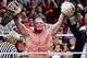 Brock Lesnar celebrates his SummerSlam win. Will Night of Champions end the same way?