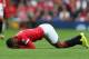 MANCHESTER, ENGLAND - AUGUST 16: Jesse Lingard of Manchester United reacts to an injury during the Barclays Premier League match between Manchester United and Swansea City at Old Trafford on August 16, 2014 in Manchester, England. (Photo by Alex Livesey