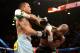 LAS VEGAS, NV - MAY 03: (L-R) Marcos Maidana and Floyd Mayweather Jr. exchange blows during their WBC/WBA welterweight unification fight at the MGM Grand Garden Arena on May 3, 2014 in Las Vegas, Nevada. (Photo by Harry How/Getty Images)
