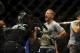 May 24, 2014; Las Vegas, NV, USA; New bantamweight champion TJ Dillashaw celebrates his TKO win over opponent Renan Barao (not pictured) following their UFC 173 bantamweight championship bout at MGM Grand Garden Arena. Mandatory Credit: Stephen R. Sylvan
