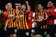 BRADFORD, ENGLAND - AUGUST 27: Players of Bradford City react after their Capital One Cup second round match between Bradford City and Leeds United at Coral Windows Stadium, Valley Parade on August 27, 2014 in Bradford, England. (Photo by Nigel Roddis/G