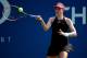 NEW YORK, NY - AUGUST 26: Christina McHale of the United States returns a shot against Chanelle Scheepers of South Africa during their women's singles first round match on Day Two of the 2014 US Open at the USTA Billie Jean King National Tennis Center on
