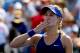 NEW YORK, NY - AUGUST 26: Eugenie Bouchard of Canada reacts after a point against Olga Govortsova of Belarus to win their women's singles first round match on Day Two of the 2014 US Open at the USTA Billie Jean King National Tennis Center on August 26, 2
