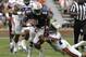 Apr 19, 2014; Auburn, AL, USA; Auburn Tigers receiver D'haquille Williams (1) is tackled by defensive back Brandon King (29) during the first half of the A-Day spring game at Jordan Hare Stadium. Mandatory Credit: John Reed-USA TODAY Sports