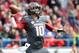 Nov 23, 2013; Little Rock, AR, USA; Arkansas Razorbacks quarterback Brandon Allen (10) looks for a open receiver against the Mississippi State Bulldogs during the second quarter at War Memorial Stadium. Mandatory Credit: Justin Ford-USA TODAY Sports