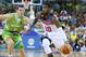 LAS PALMAS, GRAN CANARIA, SPAIN - AUGUST 26: Kyrie Irving #10 of the USA Basketball Men's National Team drives to the basket against Goran Dragic of the Slovenia Basketball Men's National Team on August 26, 2014 at Gran Canaria Arena in Las Palmas, Gran