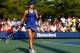 NEW YORK, NY - AUGUST 26: Catherine Bellis of the United States celebrates against Dominika Cibulkova of Slovakia during their women's singles first round match on Day Two of the 2014 US Open at the USTA Billie Jean King National Tennis Center on August