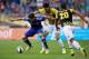 ARNHEM, NETHERLANDS - JULY 30: Marko Vejinovic of Vitesse and Marco van Ginkel of Chelsea battle for the ball during the pre season friendly match between Vitesse Arnhem and Chelsea at the Gelredome Stadium on July 30, 2014 in Arnhem, Netherlands. (Phot