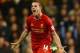 LONDON, ENGLAND - DECEMBER 15: Jordan Henderson of Liverpool celebrates scoring their second goal during the Barclays Premier League match between Tottenham Hotspur and Liverpool at White Hart Lane on December 15, 2013 in London, England. (Photo by Paul