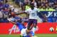 LEICESTER, ENGLAND - AUGUST 16: Romelu Lukaku of Everton is tackled by Liam Moore of Leicester City during the Barclays Premier League match between Leicester City and Everton at the King Power Stadium on August 16, 2014 in Leicester, England. (Photo by