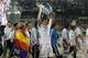 MADRID, SPAIN - MAY 25: Real Madrid player Gareth Bale lifts the trophy during the Real Madrid celebration the day after winning the UEFA Champions League final at Santiago Bernabeu Stadium on May 25, 2014 in Madrid, Spain. Real Madrid CF achieves their