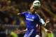 BURNLEY, ENGLAND - AUGUST 18: Didier Drogba of Chelsea controls the ball under pressure from Kieran Trippier of Burnley during the Barclays Premier League match between Burnley and Chelsea at Turf Moor on August 18, 2014 in Burnley, England. (Photo by L