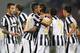REGGIO NELL'EMILIA, ITALY - AUGUST 23: Roberto Pereyra with his teammates of FC Juventus celebrates after scoring the opening goal during the TIM Preseason Tournament between US Sassuolo, FC Juventus and AC Milan at Mapei Stadium - Citta' del Tricolore o