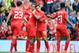 LIVERPOOL, ENGLAND - AUGUST 10: Daniel Sturridge (C) of Liverpool celebrates with team-mate Philippe Coutinho after he scores the first goal of the game for his side during the Pre Season Friendly match between Liverpool and Borussia Dortmund at Anfield
