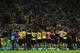LONDON, ENGLAND - OCTOBER 22: Borussia Dortmund players celebrate victory at the final whistle with his team mates during the UEFA Champions League Group F match between Arsenal and Borussia Dortmund at Emirates Stadium on October 22, 2013 in London, E