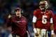 CHARLOTTE, NC - DECEMBER 07: Head coach Jimbo Fisher and quarterback Jameis Winston #5 of the Florida State Seminoles looks on against the Duke Blue Devils during the ACC Championship game at Bank of America Stadium on December 7, 2013 in Charlotte, Nort