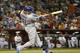 PHOENIX, AZ - AUGUST 26: Justin Turner #10 of the Los Angeles Dodgers hits a RBI single against the Arizona Diamondbacks during the fourth inning of the MLB game at Chase Field on August 26, 2014 in Phoenix, Arizona. (Photo by Christian Petersen/Getty I
