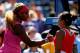 NEW YORK, NY - AUGUST 28: Serena Williams of the United States meets Vania King of the United States after winning their women's singles second round match on Day Four of the 2014 US Open at the USTA Billie Jean King National Tennis Center on August 28,