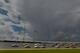 Jul 6, 2014; Daytona Beach, FL, USA; NASCAR Sprint Cup Series driver Reed Sorenson (36) leads a pack of cars as storm clouds roll in during the Coke Zero 400 at Daytona International Speedway. Mandatory Credit: Jasen Vinlove-USA TODAY Sports
