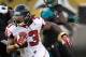 Aug 28, 2014; Jacksonville, FL, USA; Atlanta Falcons running back Devonta Freeman (33) rushes against the Jacksonville Jaguars at EverBank Field. Mandatory Credit: Richard Dole-USA TODAY Sports